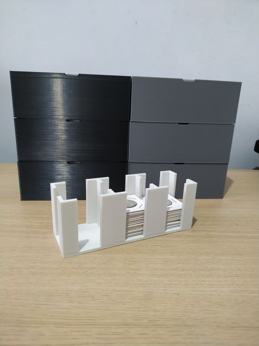 Suportes organizadores para moedas em alvéolos