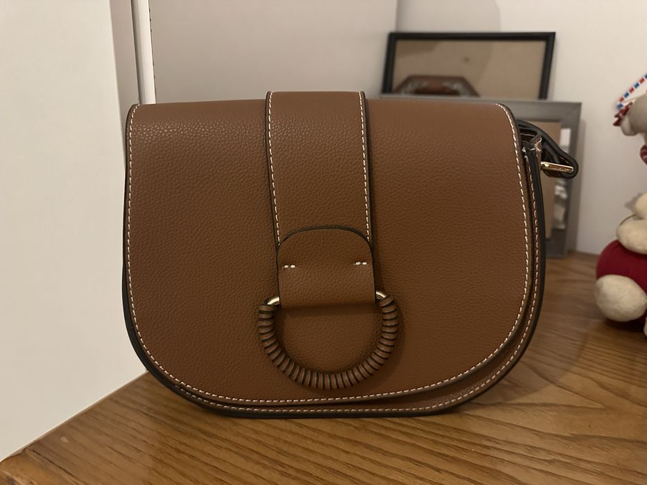 Mala castanha com tiracolo