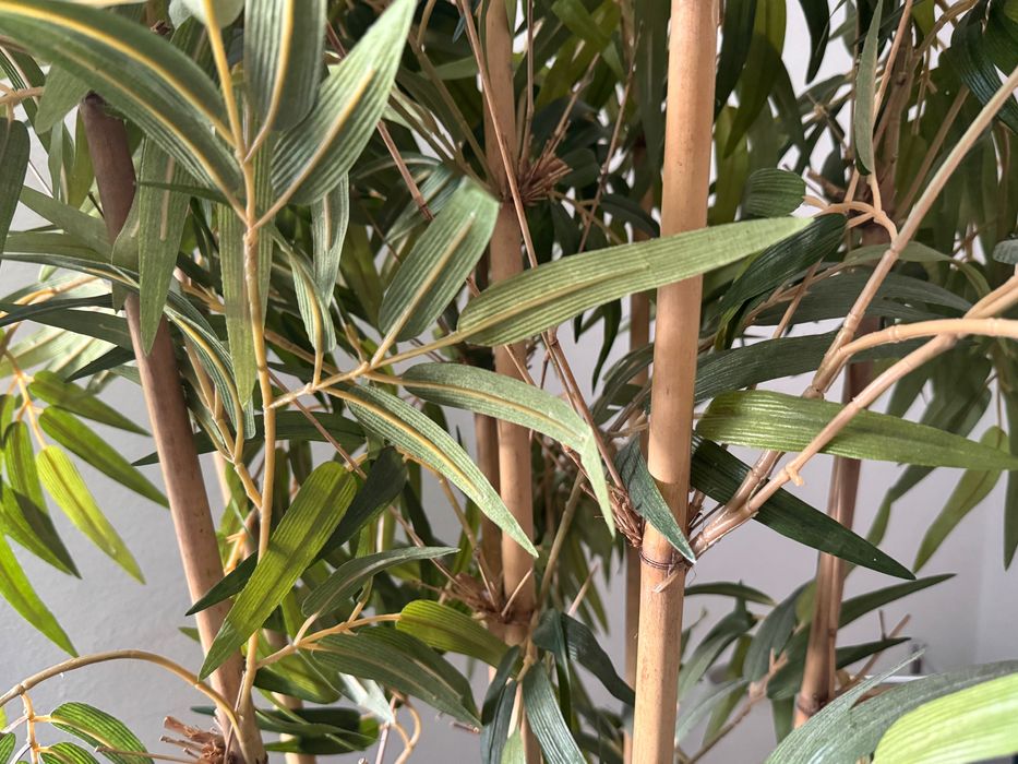 2 artificial bamboo plants with terracotta pots, great realistic look.