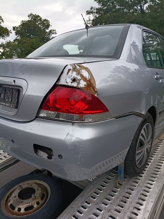 Lancer 1.6 16v automat. Maska. Czesci