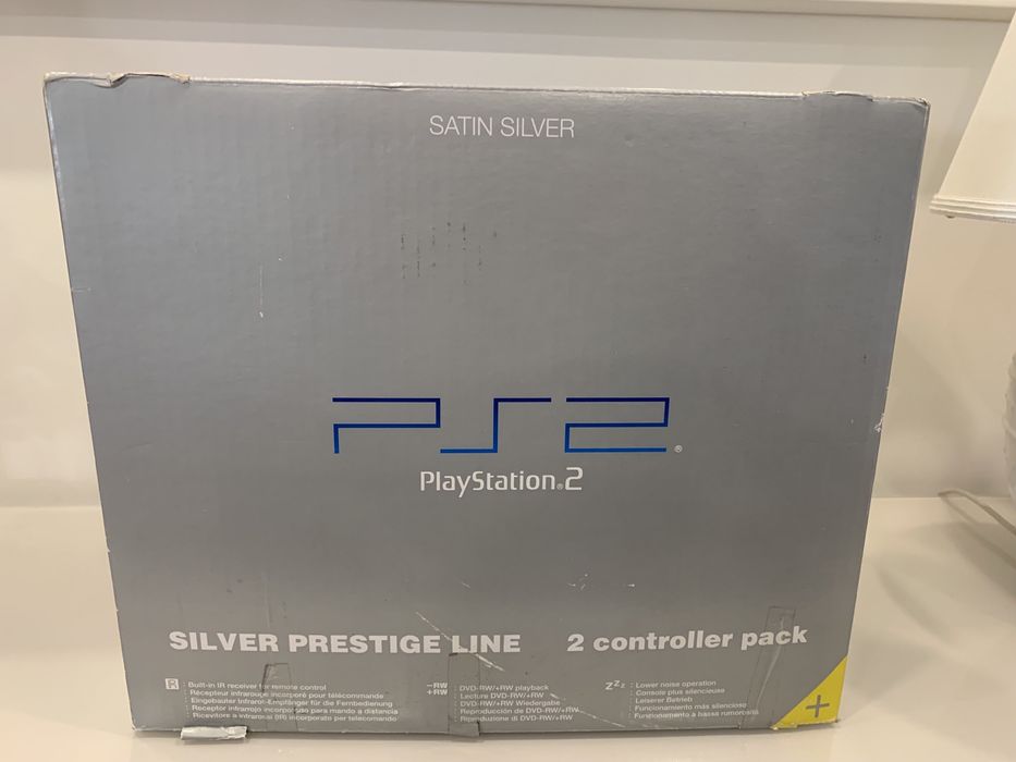 PlayStation 2 Silver Prestige Line – Box, Controllers, and Games64284417347329124