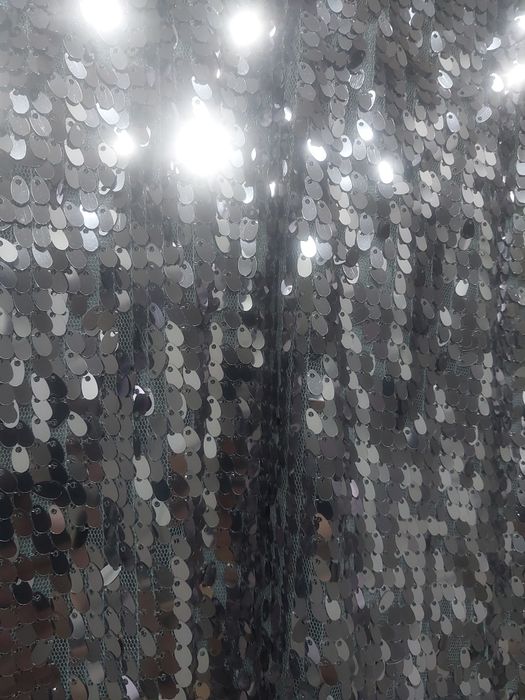 Sprzedam sukienkę cekinową .