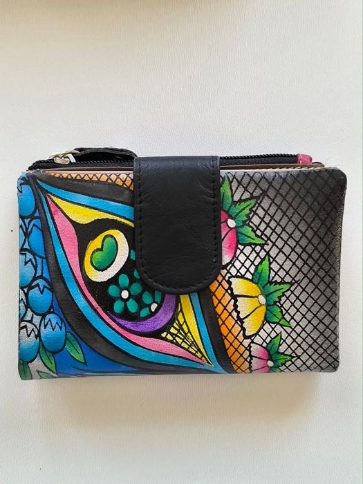 Carteira em pele 
Novo na caixa 
Tamanho 14*10