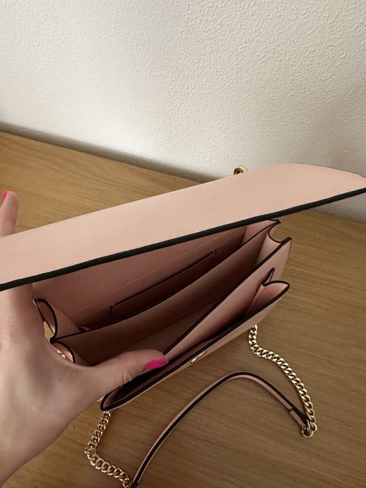 Mala rosa com alça tiracolo