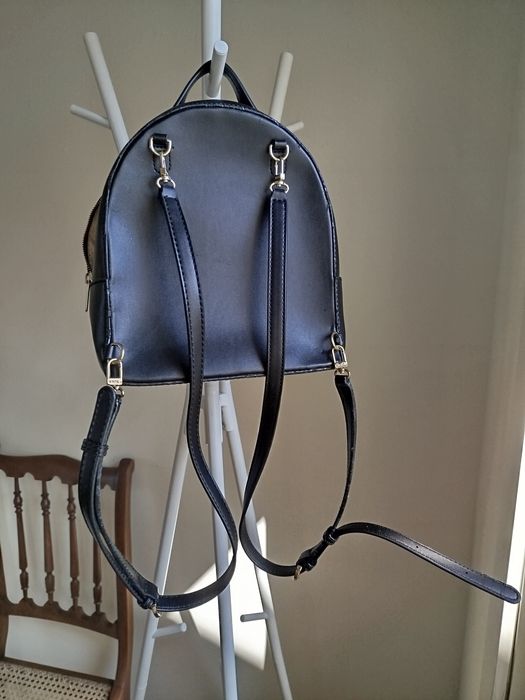 Mochila preta da tous  tenho certificado de autenticidade