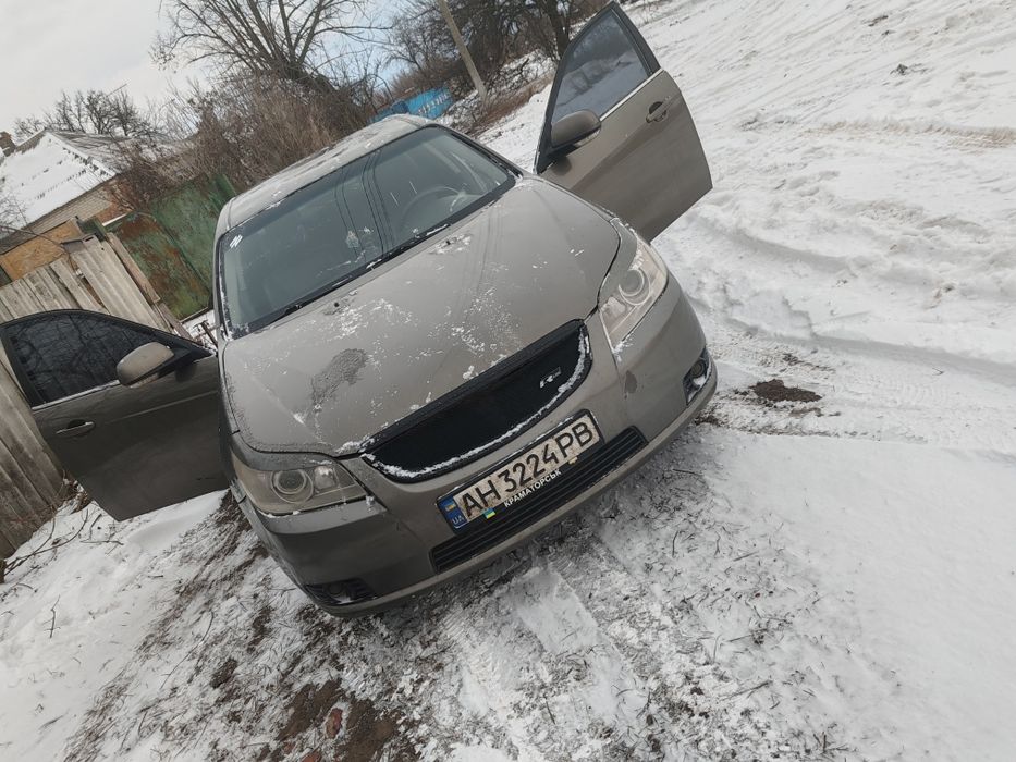 Эпика 2.5, газ Бенз автомат