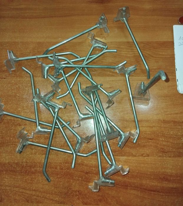 Ganchos cromados para expositores