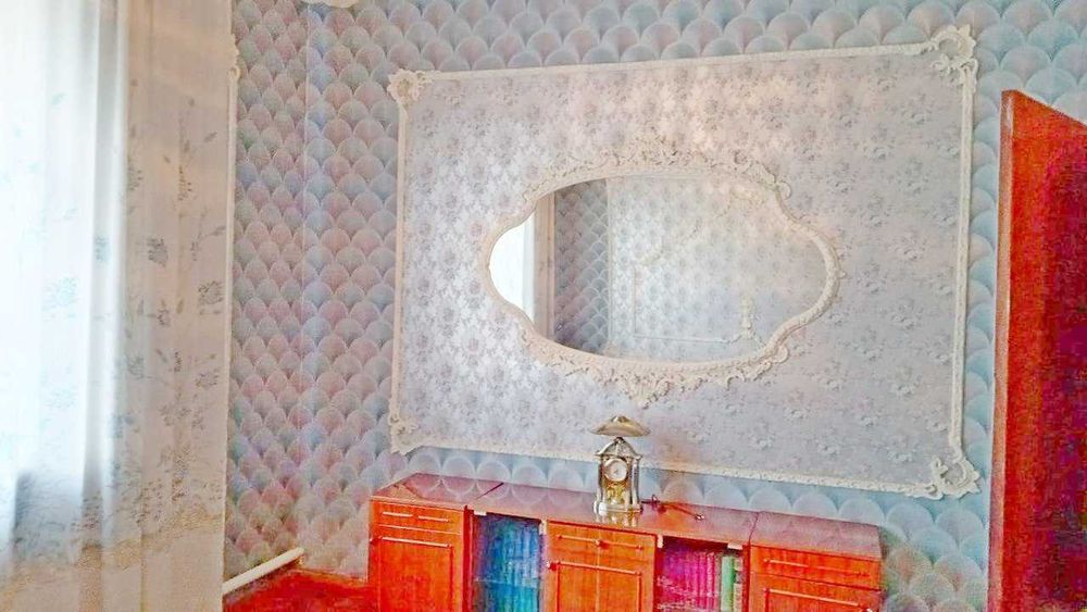 житловий будинок з літньою кухнею та гаражем
