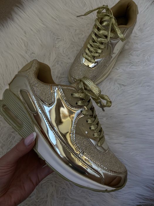 Жіночі  кросівки