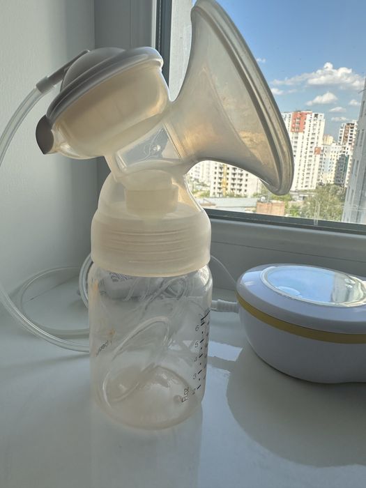 автоматичний молоковідсмоктувач medela