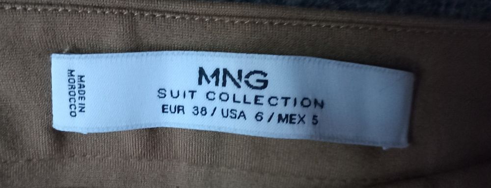 Брюки от бренда Mango