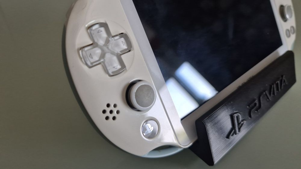 Ps vita slim com jogos instalados.