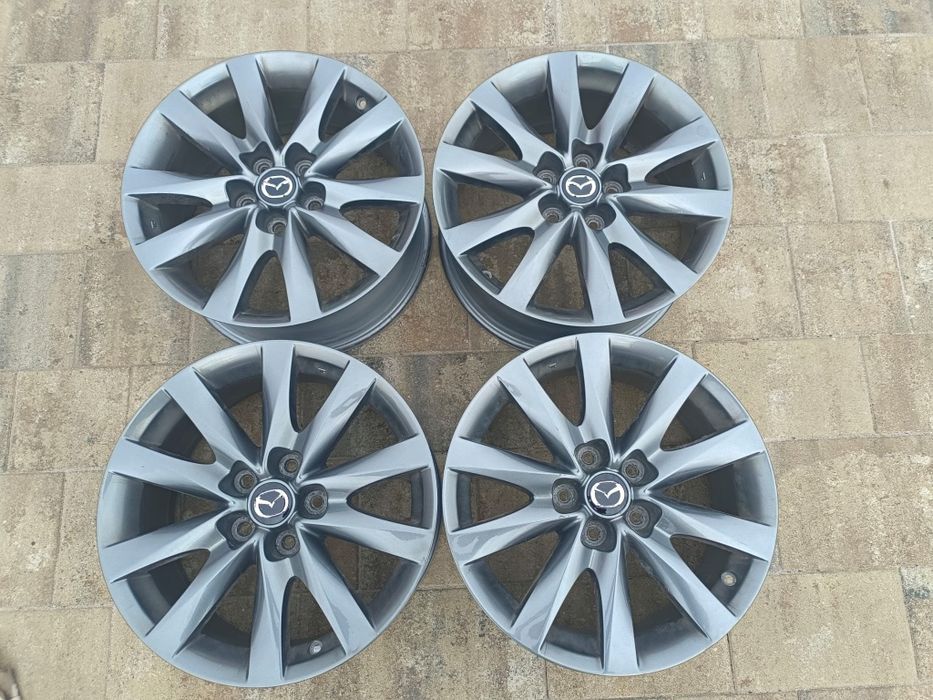 Oryginalne felgi aluminiowe Mazda, R17 5x114.3, ET 50, dekielki