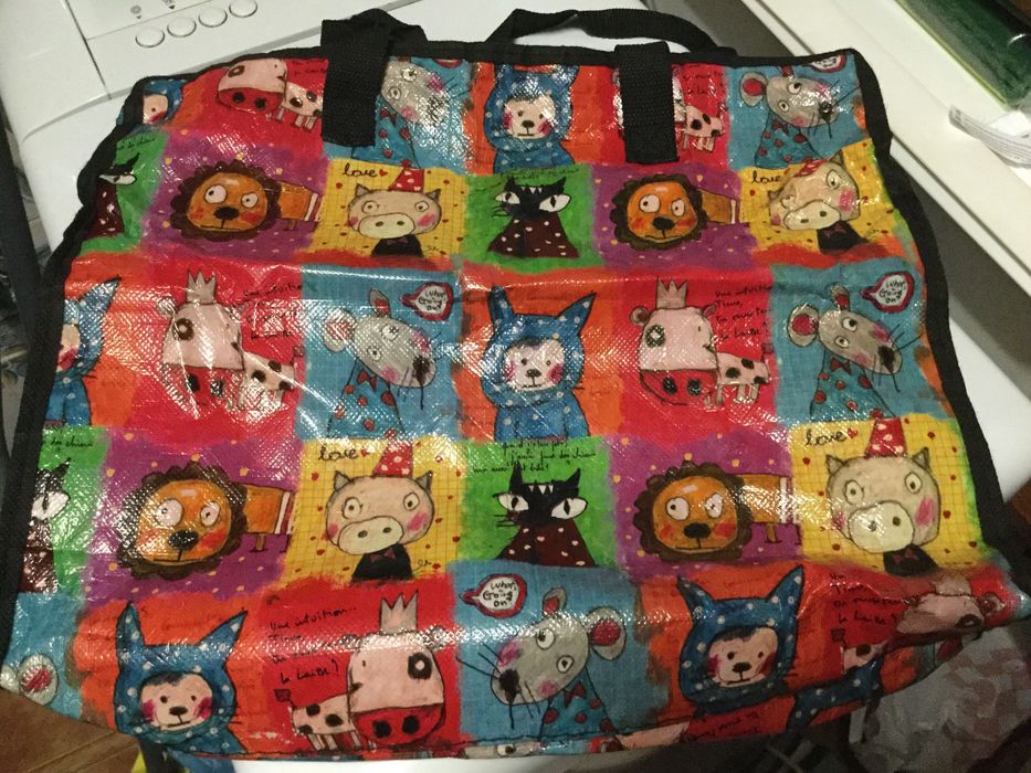 Saco em material plastico. 38x36cm. Novo!