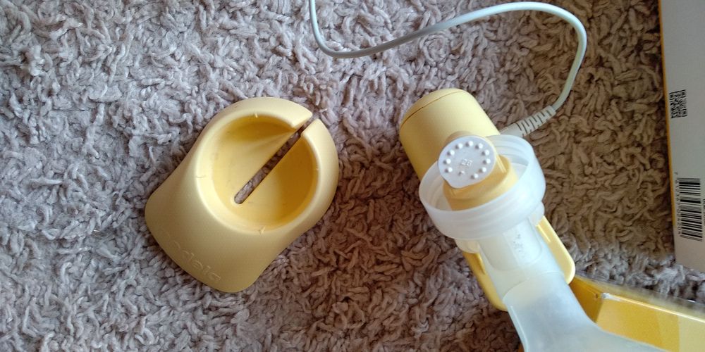 Молокоотсос MEDELA электрический