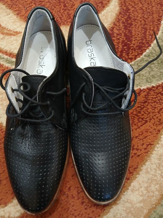 Нові чоловічі туфлі