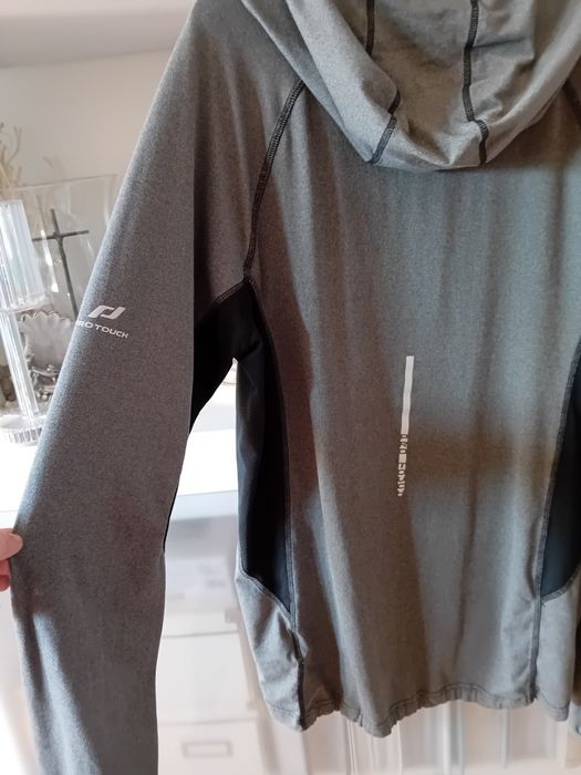 Bluza sportowa marki Pro Touch z kapturem i kominem
