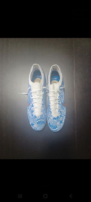 Chuteiras CR7 Pitons FG