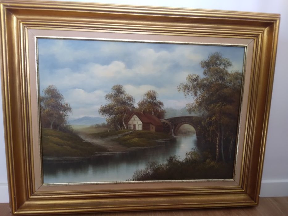 Quadro casa no lago com moldura banhada a ouro