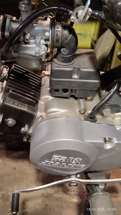 Мотор мопеда 110 кубиків.