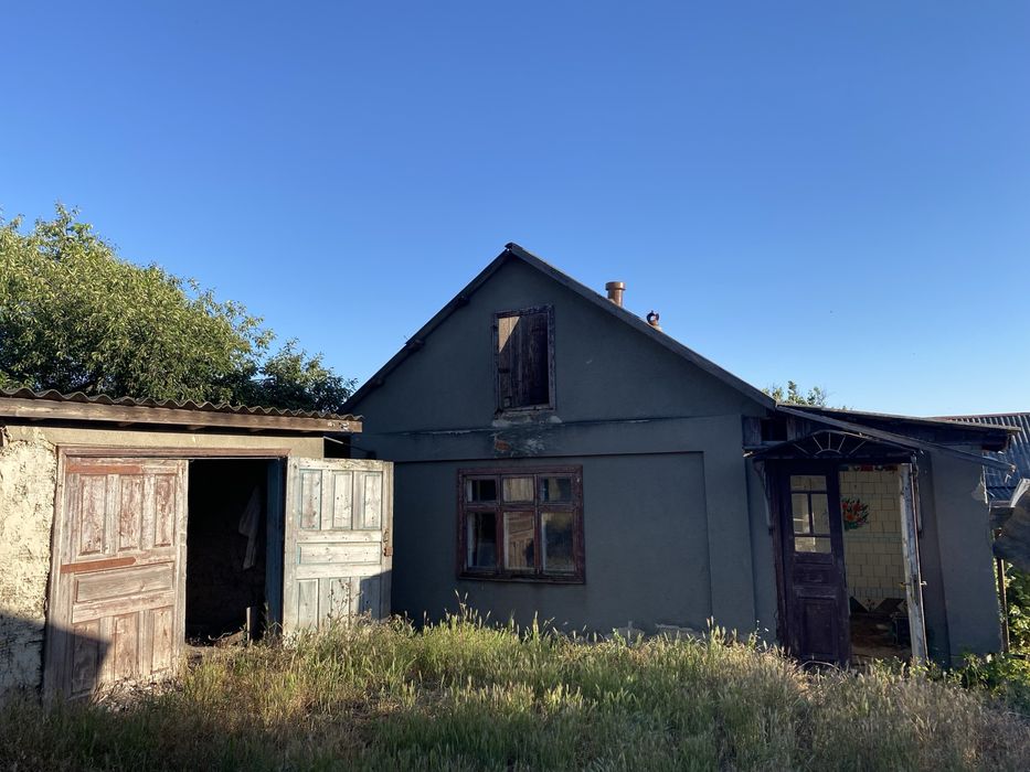 Продам дом з гаражем , вул. Карла Маркса