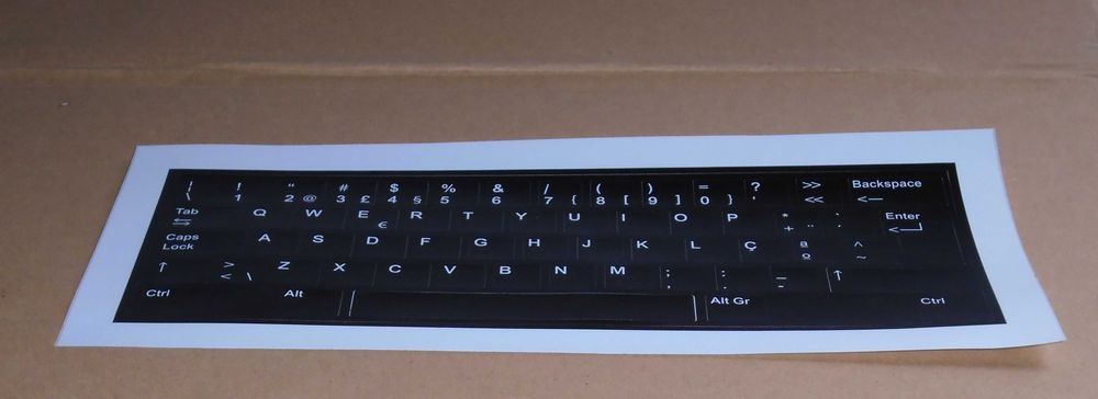 Self-adhesive keys convert foreign keyboards into NEW Portuguese64585104113537121