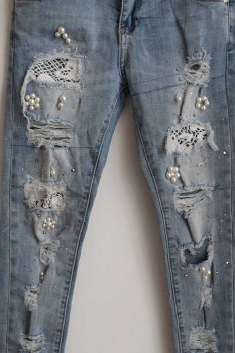 Jeansy z dziurami roz.S