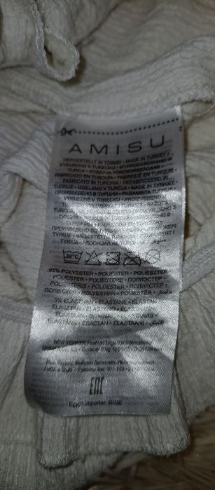Biała bluzka AMISU rozmiar XS ozdobne guziki marszczona gumką dół