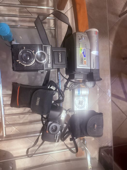 Фотоаппараты,видеокамера одним лотом