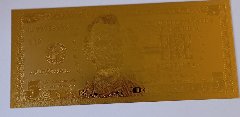 Coleção de notas de dólares revistidas a ouro