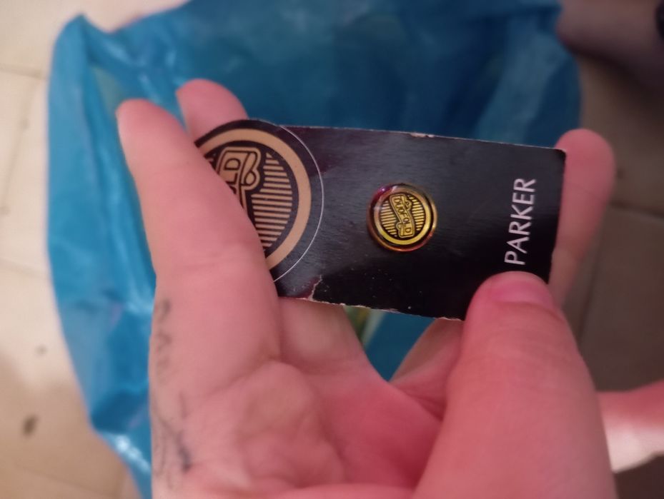 Pins Parker desporto