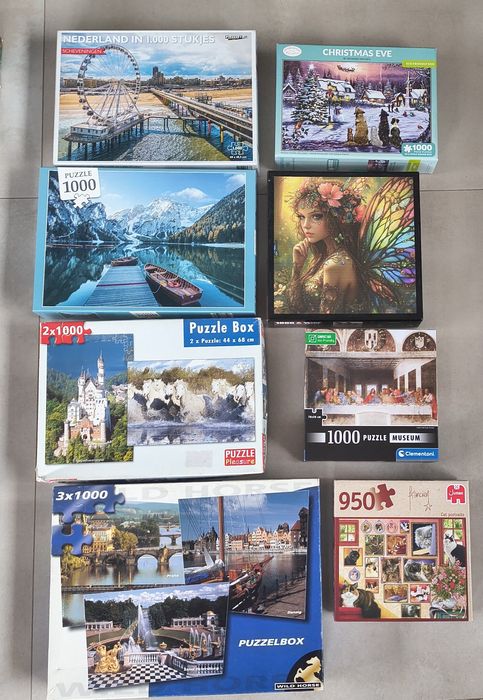 8 pudełek po 1000 elementów puzzle