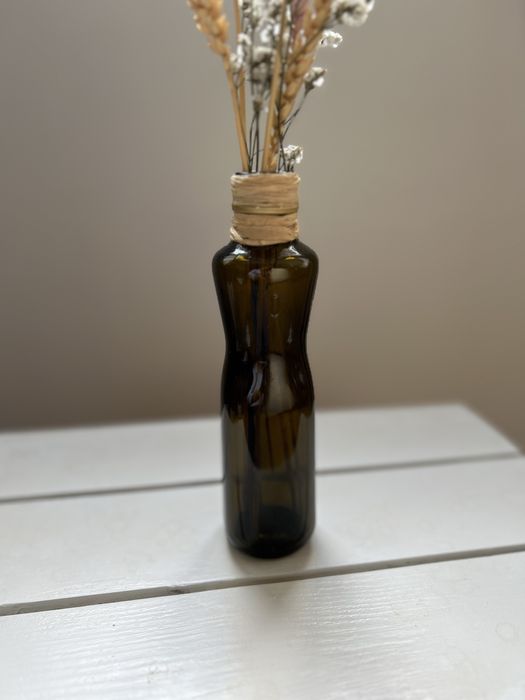 Garrafa decorativa feita de material reutilizádo