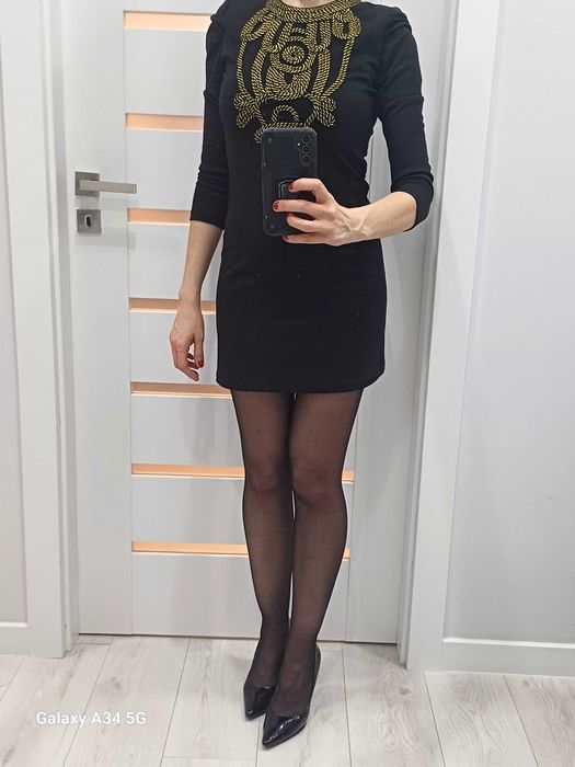 Sukienka ze złotą aplikacją. Rozmiar S