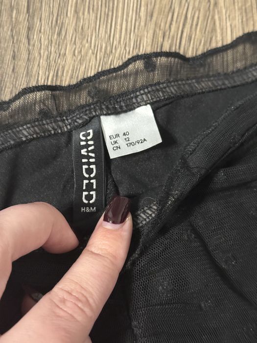 Чорний топ H&M.