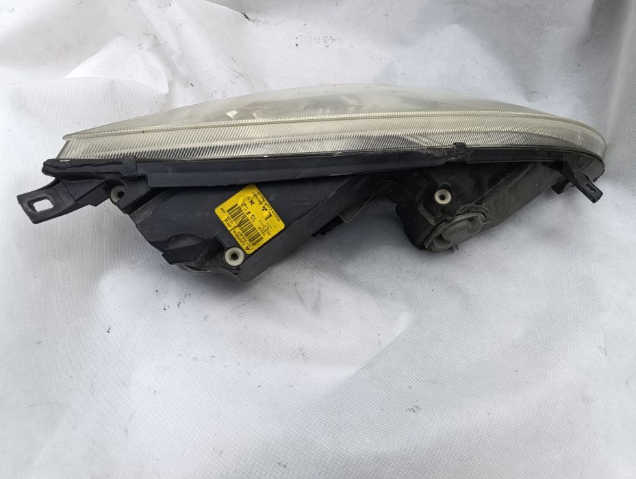 Mitsubishi Colt VI 6 lampa przednia lewa AL