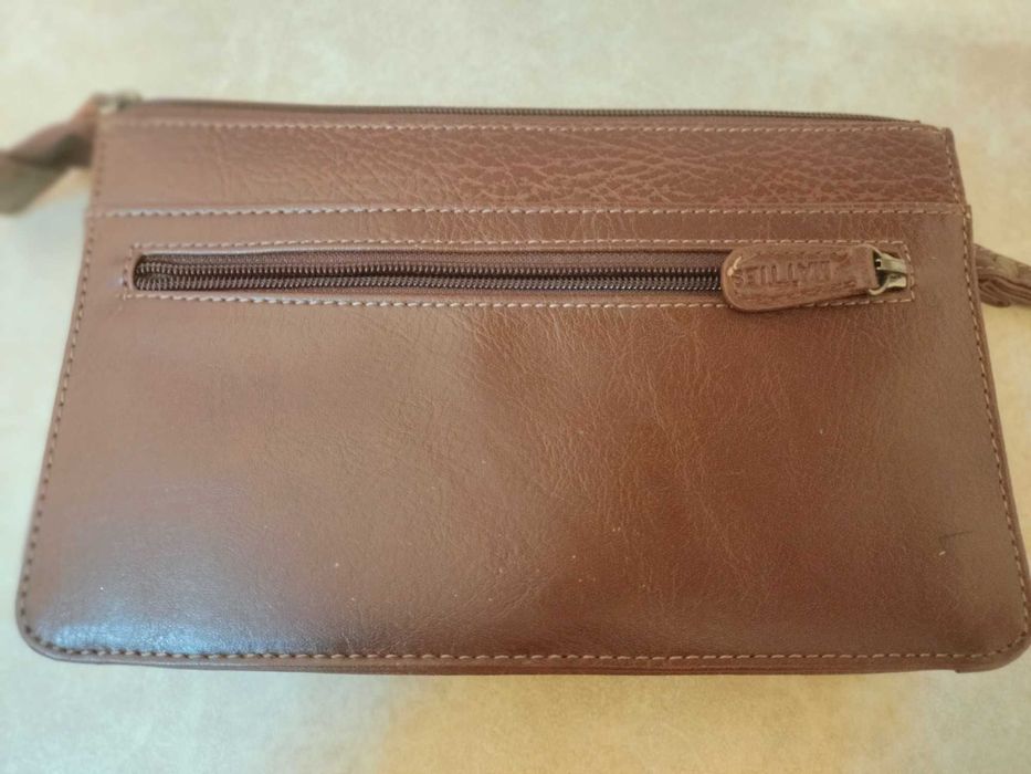 Carteira e Bolsa de pulso para homem em pele novos