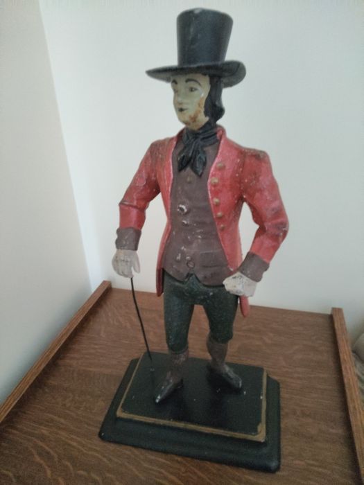 Estatueta tipo clock seller