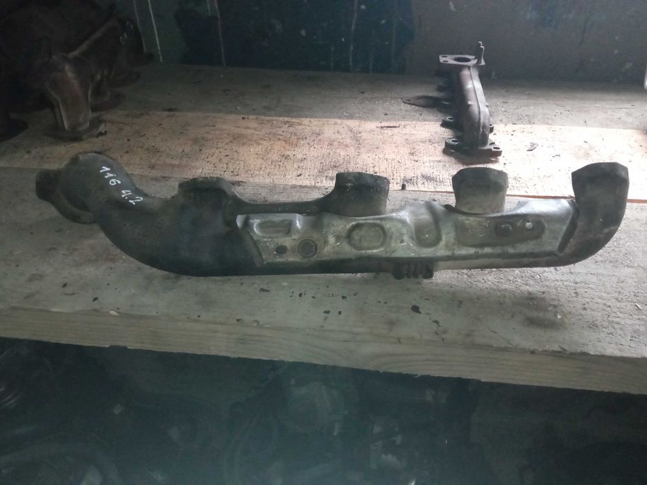 Колектор випускний коллектор випуск Mercedes OM116 4.2 1161422402