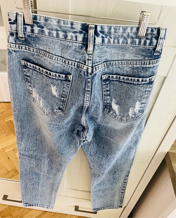 Nowe spodnie jeansowe L przetarcia mommy