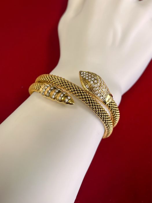 Pulseira em prata dourada em forma de cobra