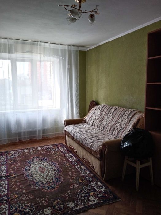 Кімната в сімейному гуртожитку