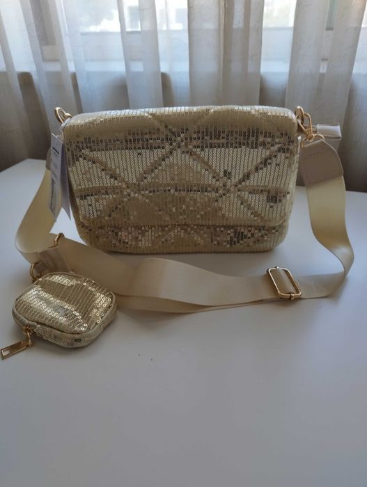 Malas (novas c/ etiqueta) com brilhantes