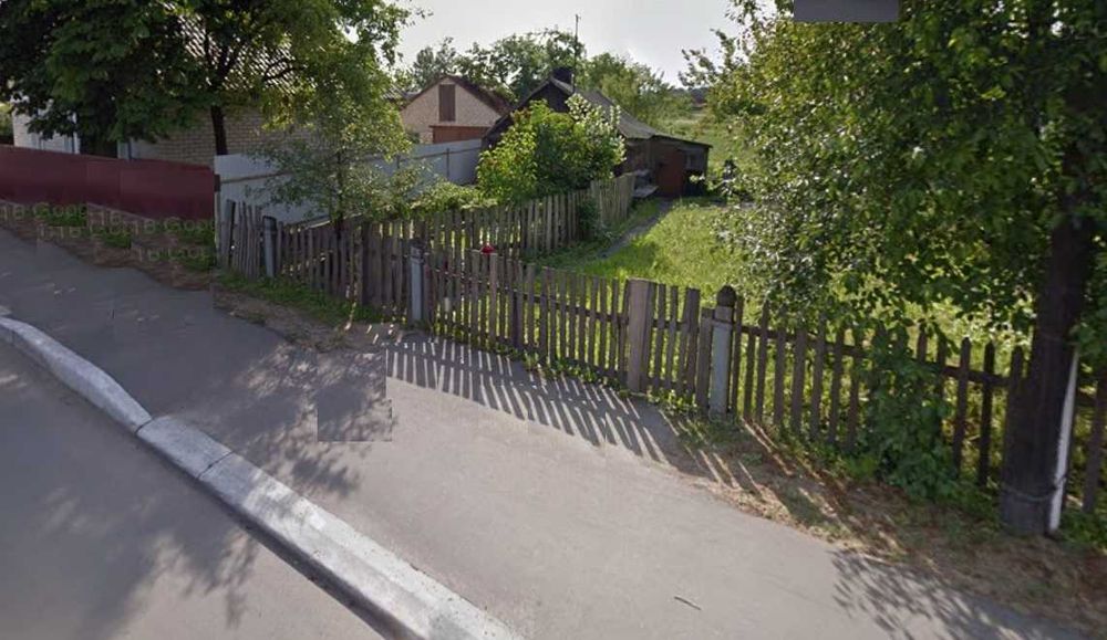 Земельну ділянку по вул Володимирській