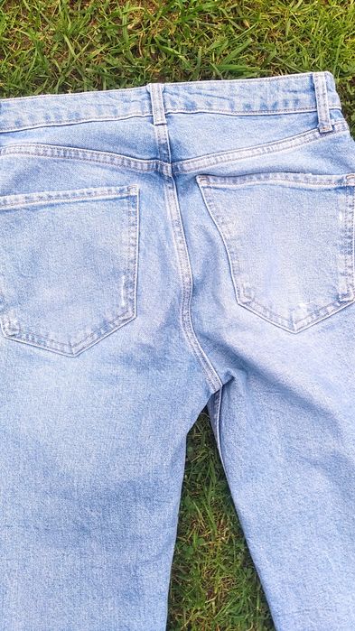 Jasne niebieskie jeansy z rozdarciami Zara S 36