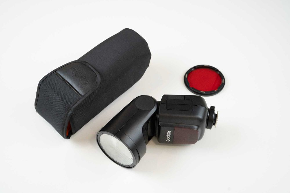 Flash Godox V1-N (para Nikon) - Cabeça Redonda com Bolsa e Acessório