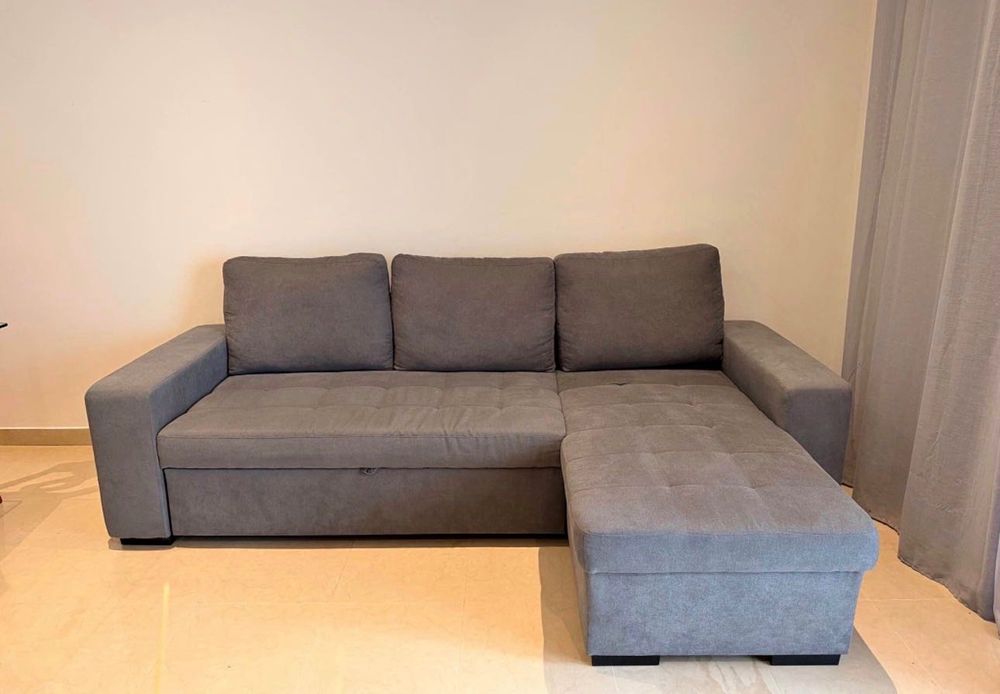 Sofá cama com chaise longue