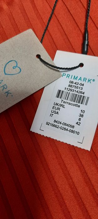 Суцільний, теракотовий купальник в рубчик Primark