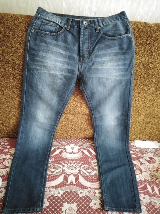 Джинсы почти новые