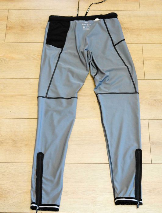 Мужские беговые тайтсы nike power tech оригинал.